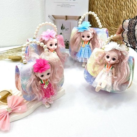 شنطة بنات مع عروسة ( الوان)