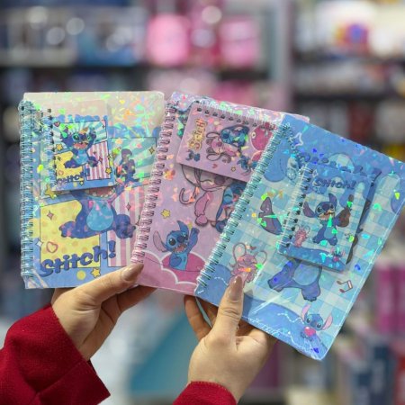 دفتر ستيتش مع مدالية نوت